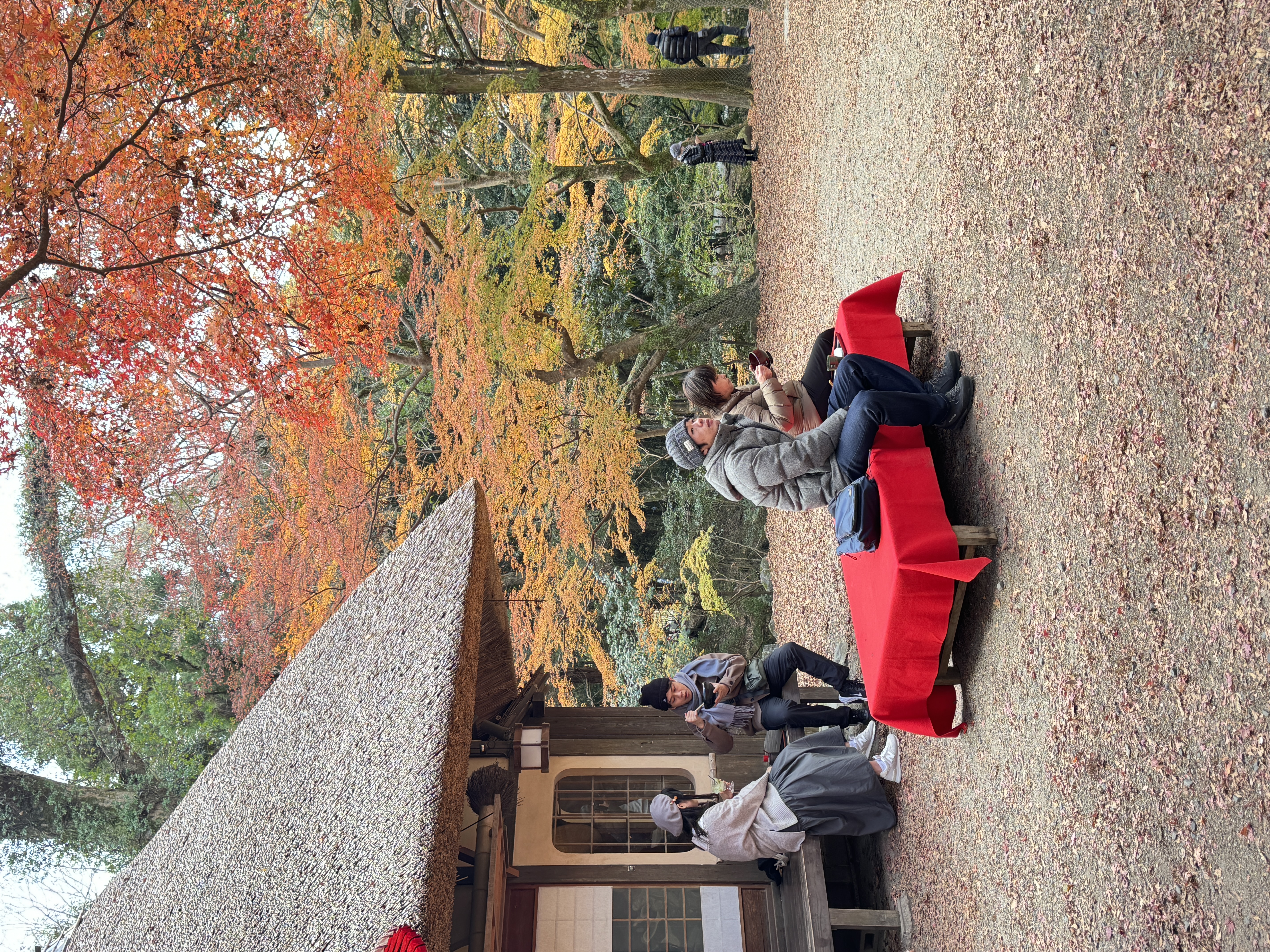 couples sitting outside teahouse